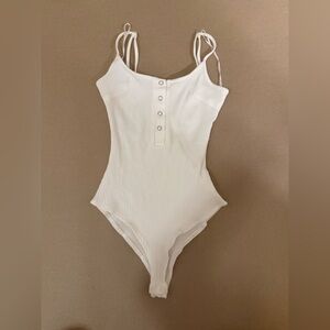 White Ribbed Bodysuit by THATSSOFETCH
